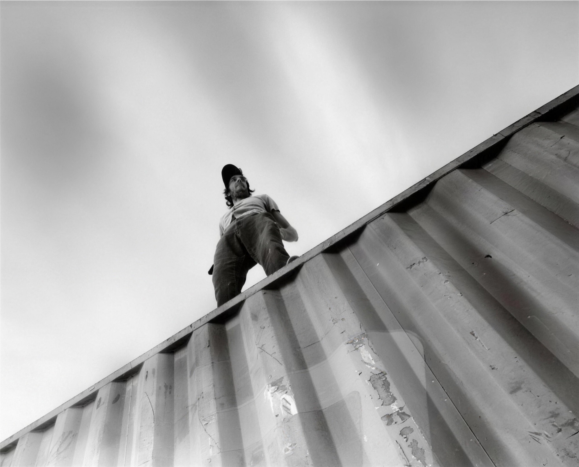 JDL Quake climbing a shipping container, Cape Town